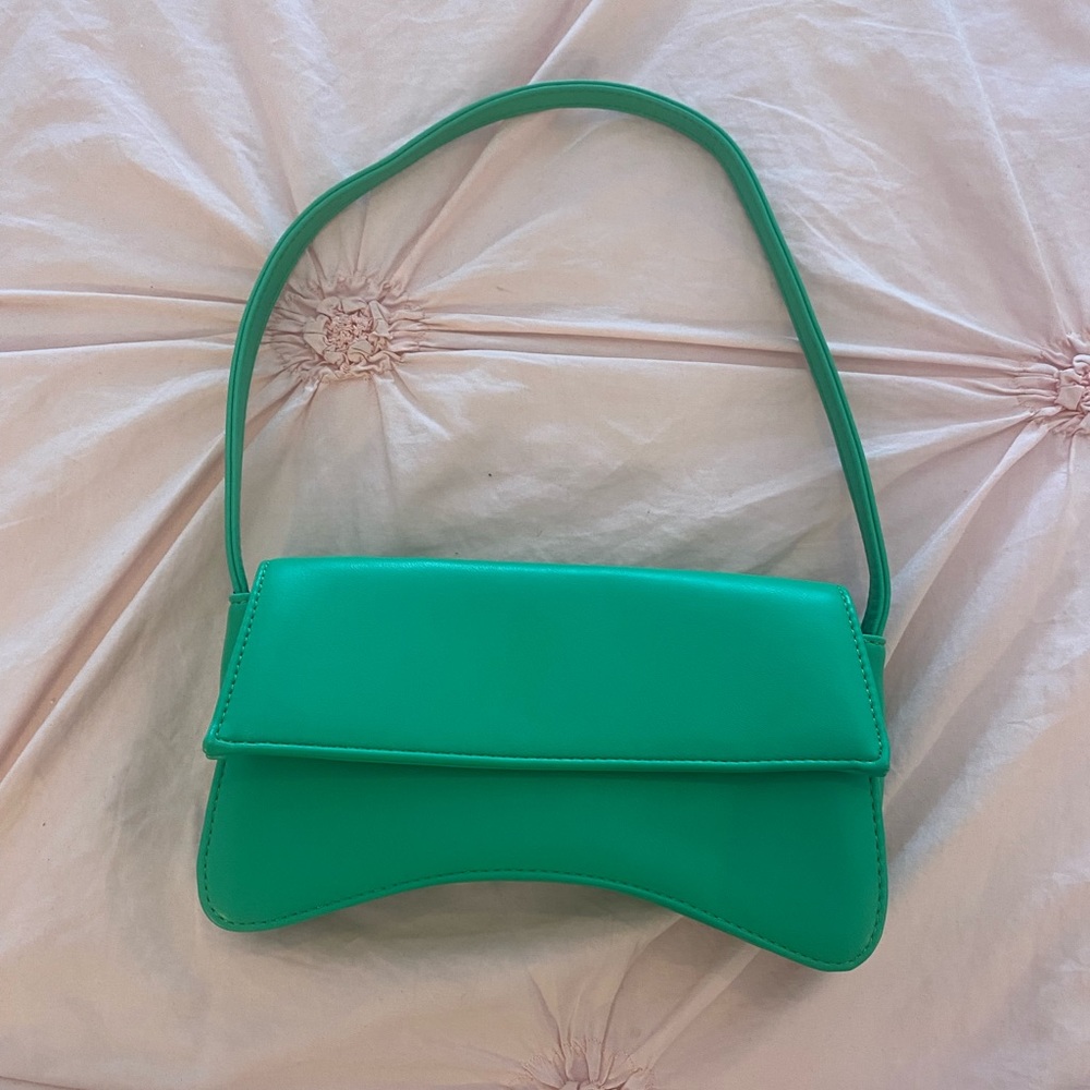 Bright green flap over shoulder bag